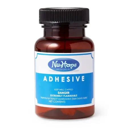 Nu-Hope Laboratories – Ostomy Adhesive 2 oz. Bottle – 2401